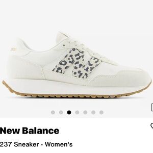 New Balance Women's 237 Sneaker in White with Leopard Accent
